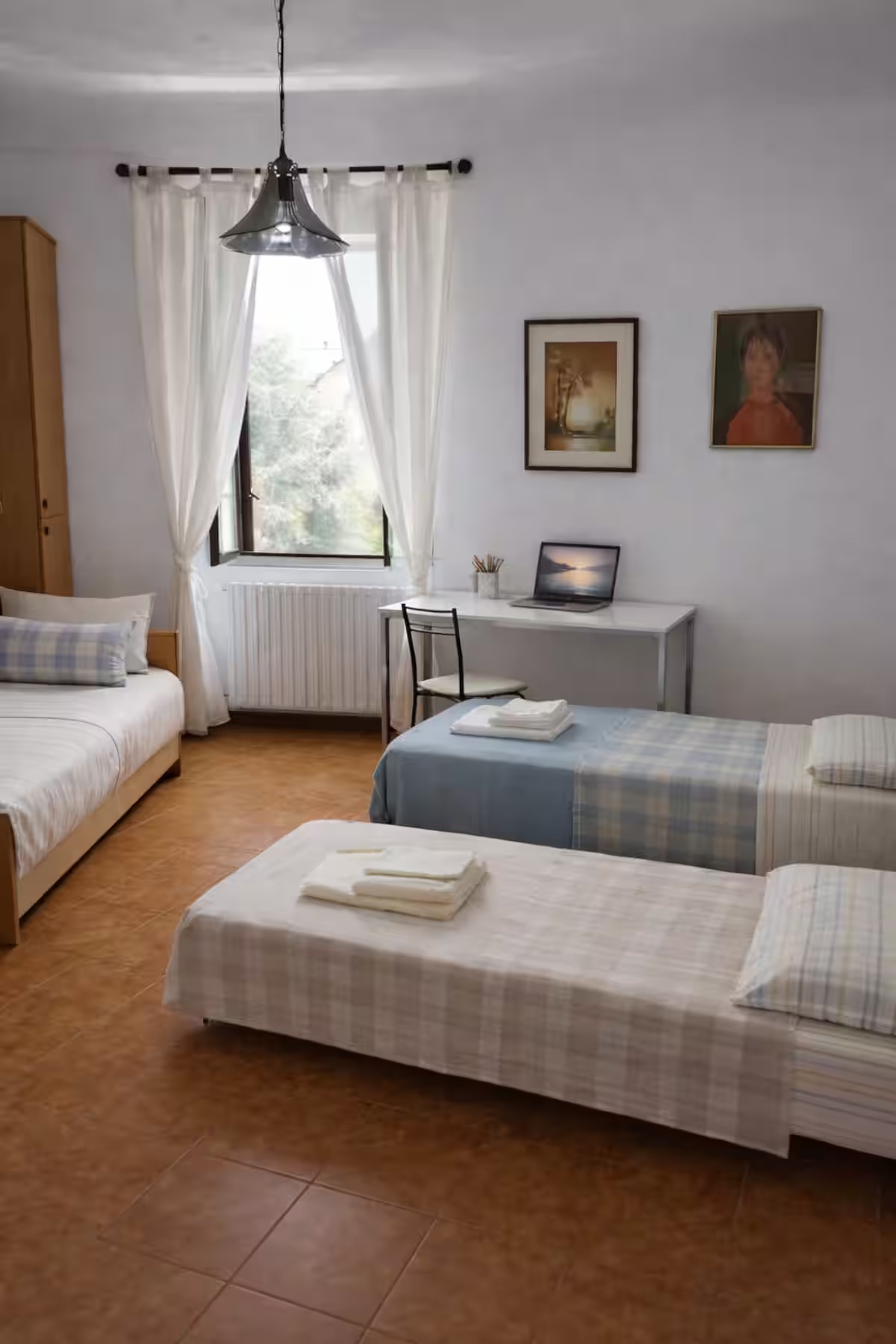 Bedroom 2 with multiple single beds